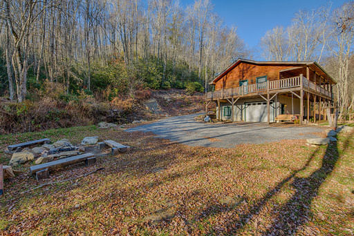 Fire pit and waterfall  in Mountain Creek Cabin in Maggie Valley, NC
