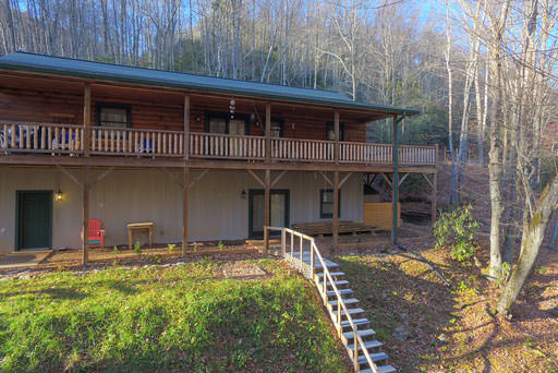 Front view of cabin and deck in Mountain Creek Cabin in Maggie Valley, NC