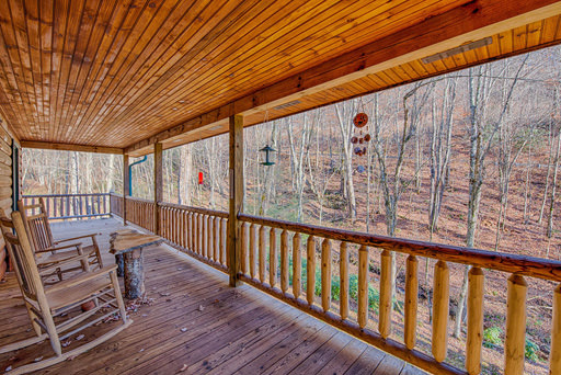 Full wrap around deck in Mountain Creek Cabin in Maggie Valley, NC
